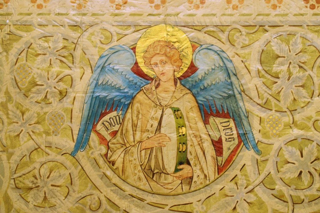 Mural of an angel with a tambourine